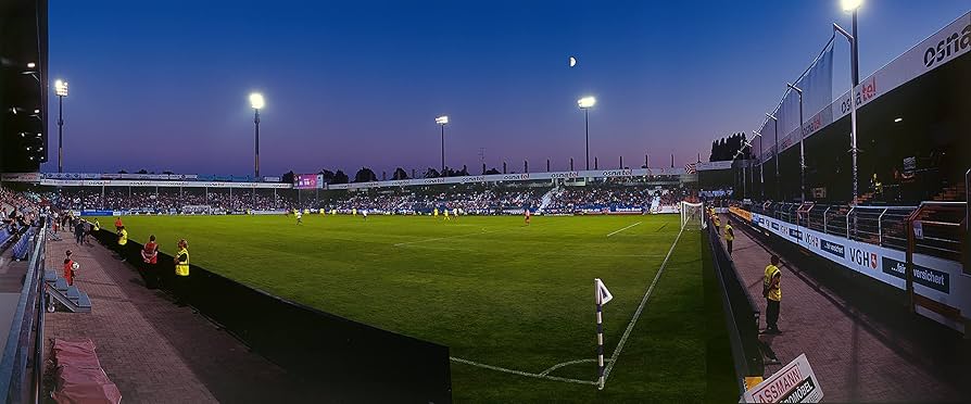 Stadionverlichting over grasmat